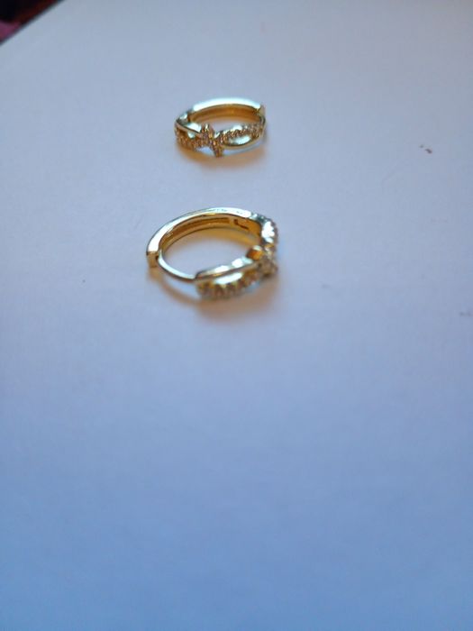 Cercei placați cu aur, NOI