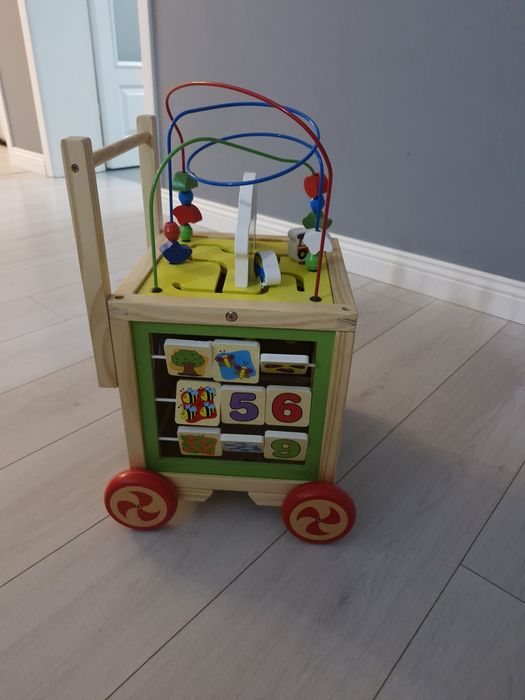 Antemergator Educational si Interactiv 6 in 1 Clock Walker Indiggo®, din Lemn