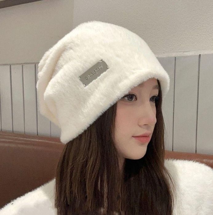 Qizlar va ayollar uchun issiq qishki shapkalar