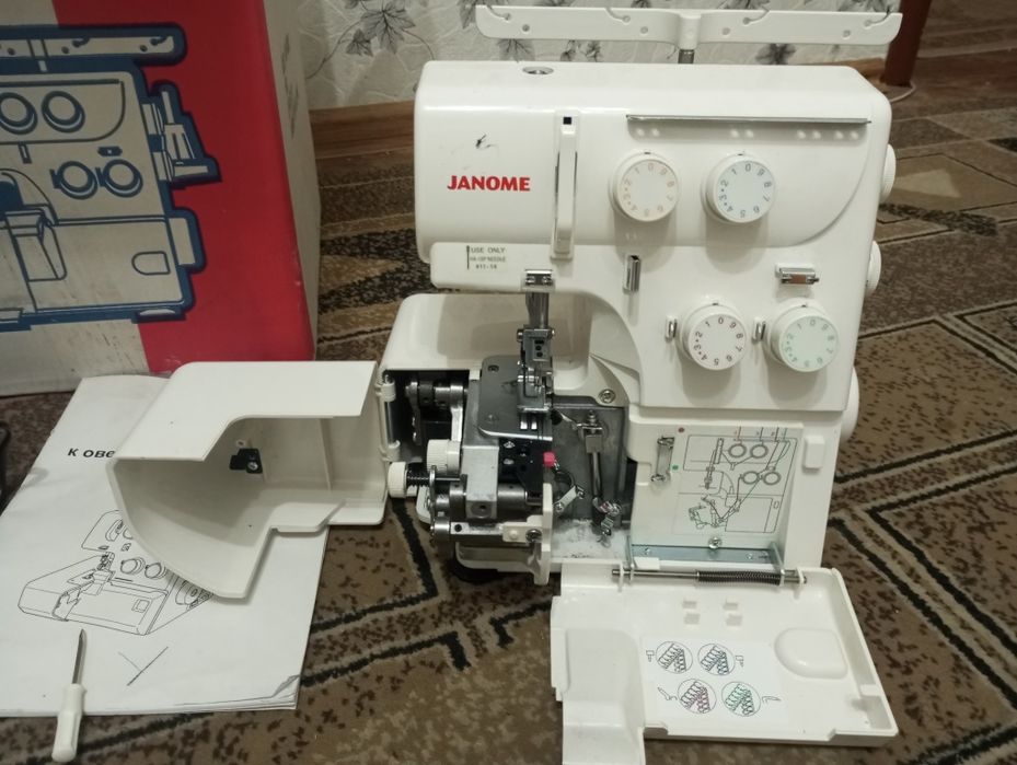 Продам Оверлок Janome HQ-090D белый