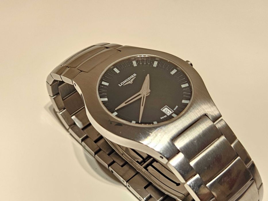 Продаван елегантен стомана кварц мъжки  дамски часовник"Longines"