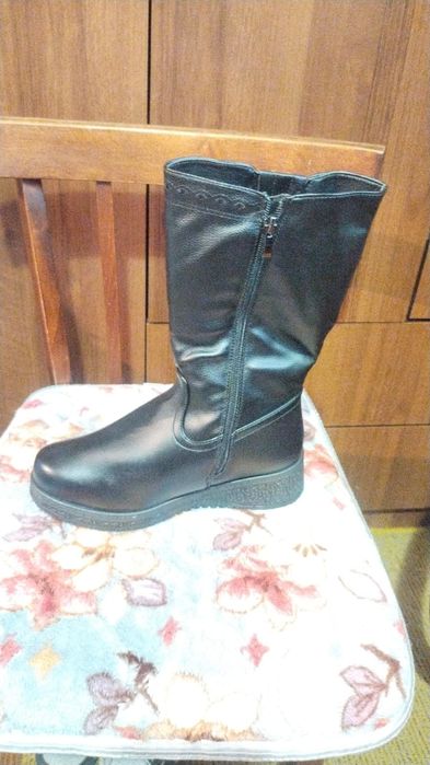 Женские сапоги..