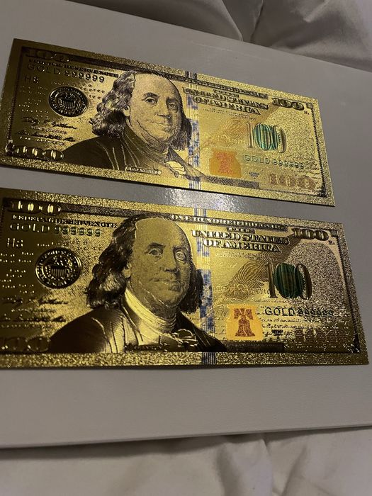 Bancnote 100 dolari aurite