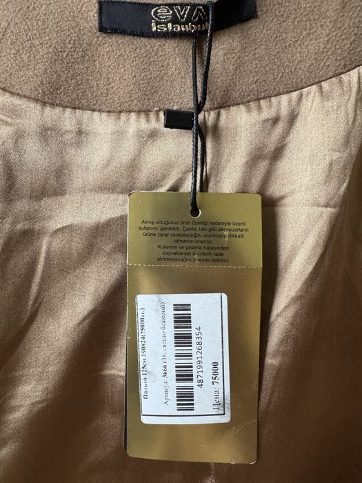 Продам пальто новый