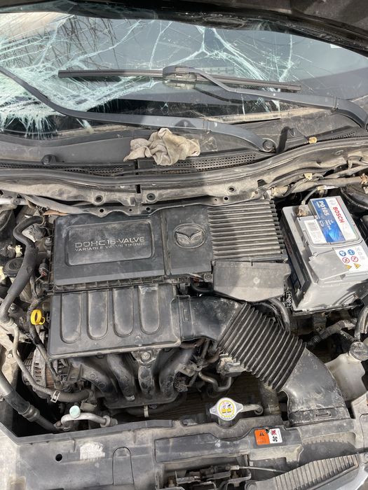Mazda 2 на части