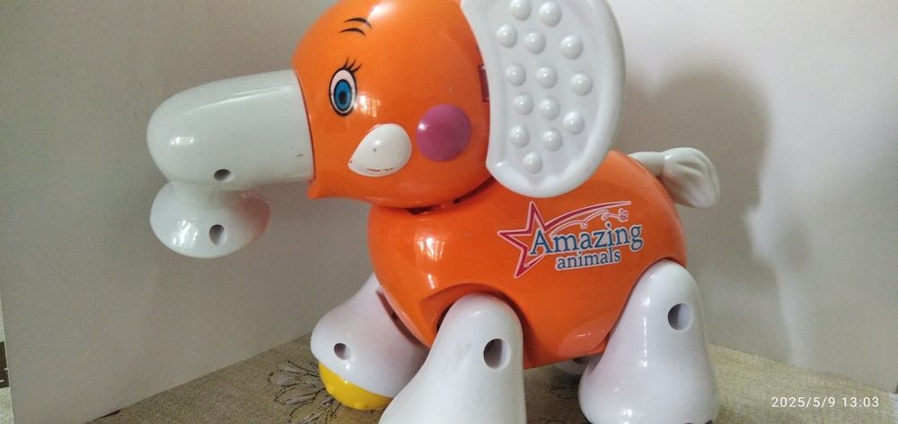 Заводная игрушка - Слоник.