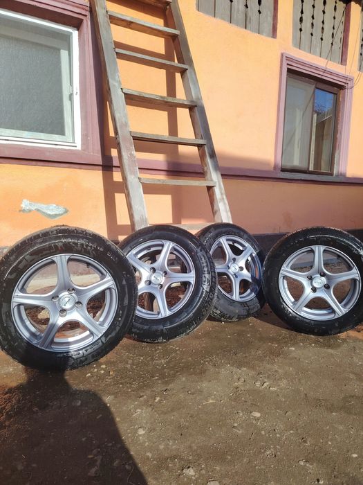 Jante 4x100 r15 cu cauciucuri de vara 185-65-r15 aproape noi