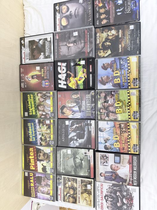 Vand DVD-uri noi
