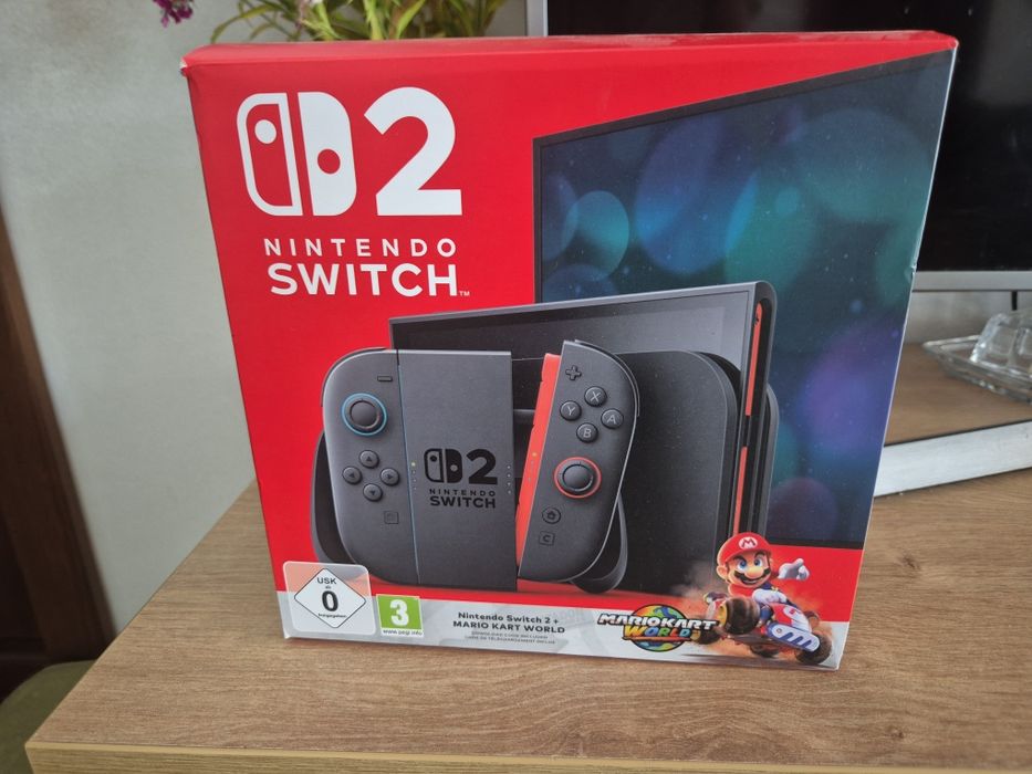 Nintendo Switch 2 + Mario Kart World + multe jocuri + cutie originală