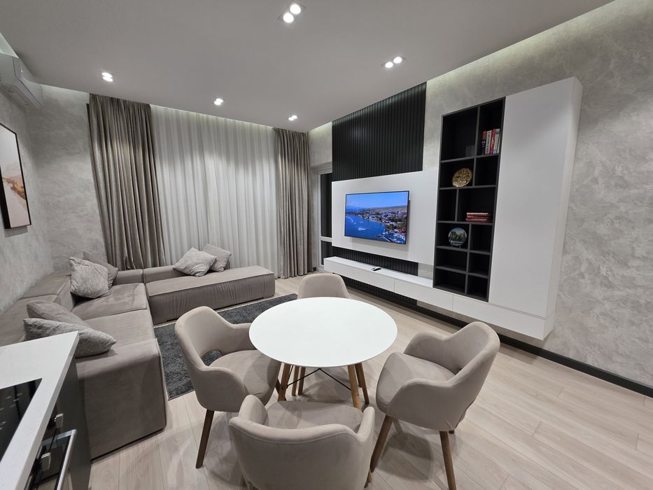 Современная квартира в NRG Oybek — мебель, техника, вид.