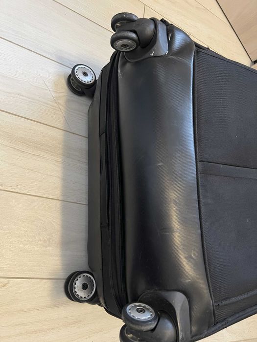 Куфар Samsonite, голям, ползван, колелцата работят префектно