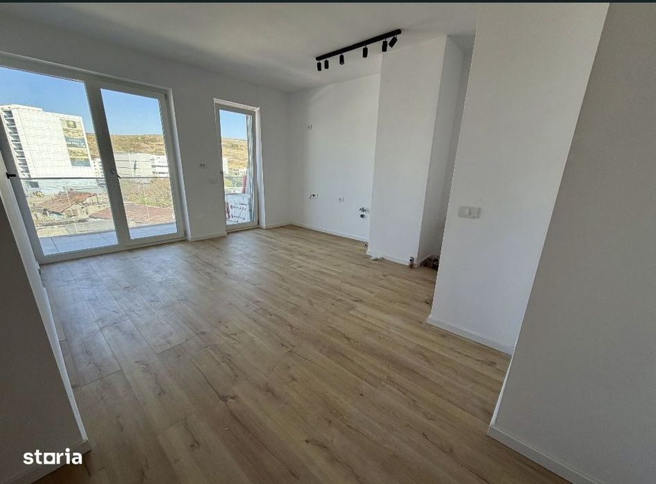 Apartament 2 camere finisat , etaj intermediar  , zona Elite Junior