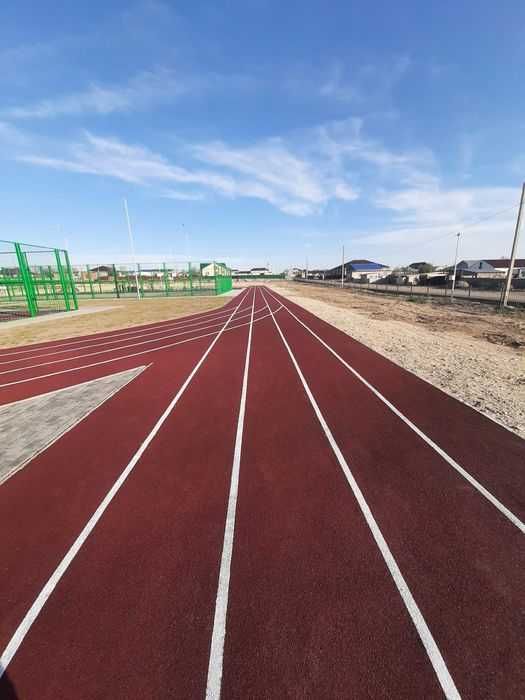 Тартановое покрытия