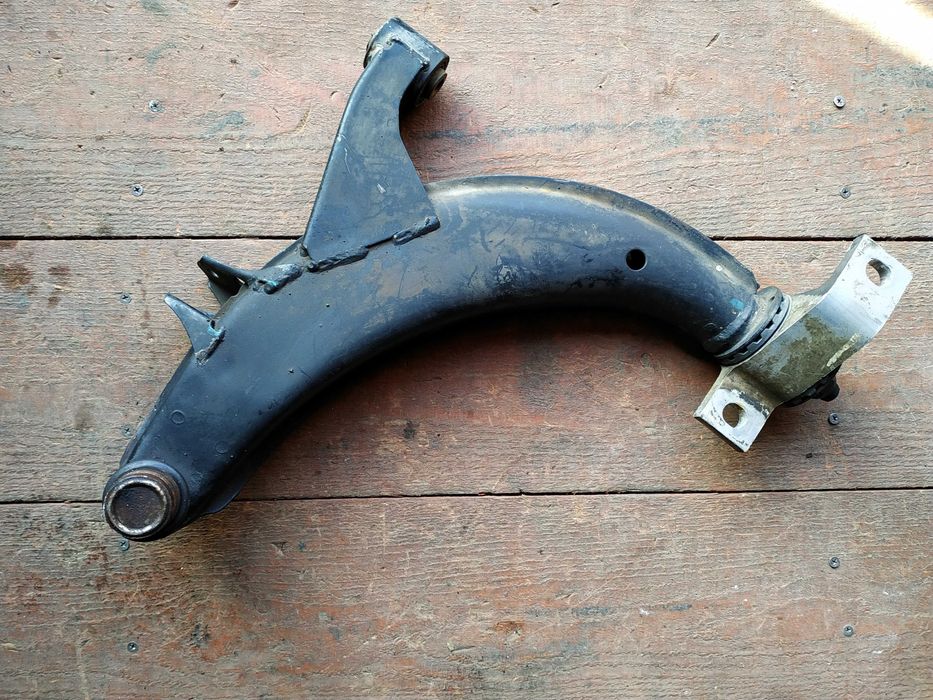 Передние рычаги на субару