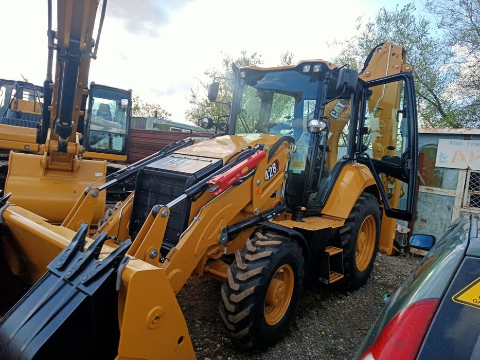 Услуги экскаватора погрузчика Cat 432
