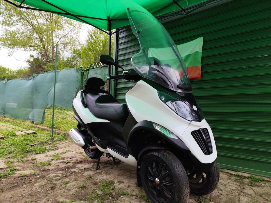 Пиаджо МП3 Piaggio MP3 300 кубика