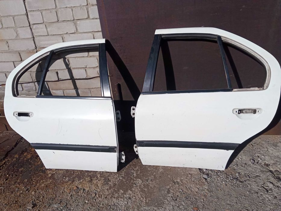 Двери задние Nissan Primera P10
