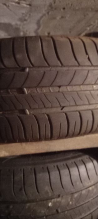 Vând set 4 jante aluminiu 5 prezoane echipate cu cauciucuri de vara .