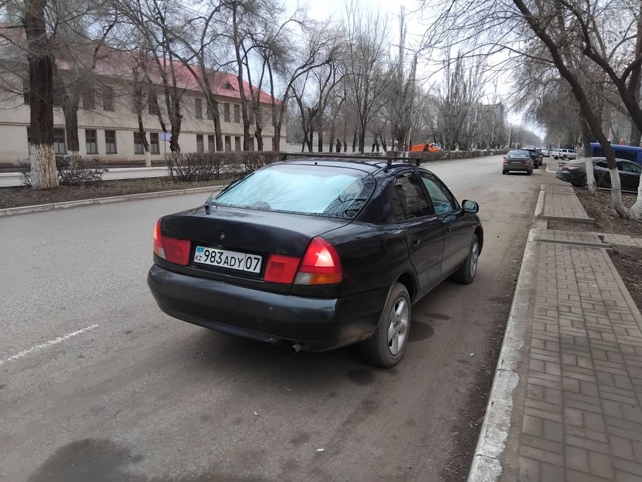 Митсубиси каризма сатылады