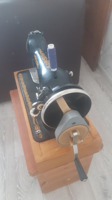 Швейная машина .