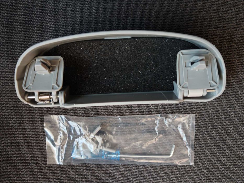 Калъф за очила на мястото на дръжката над главата