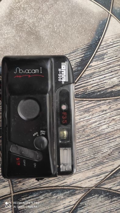 Фотоаппарат и чехол.