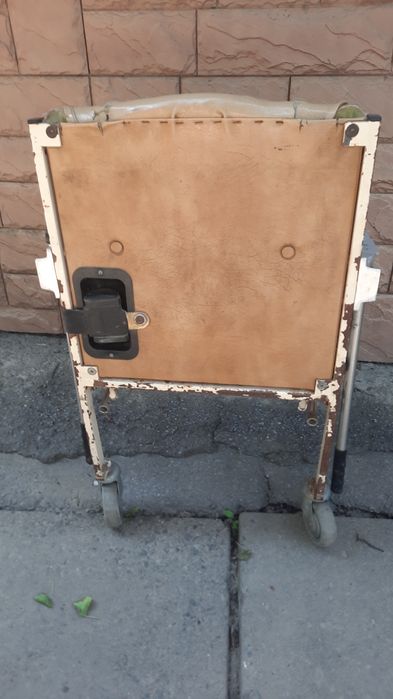 Инвалидная коляска.