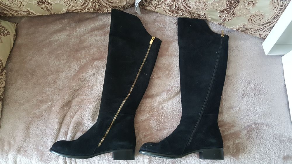 Продам новые зимние сапоги