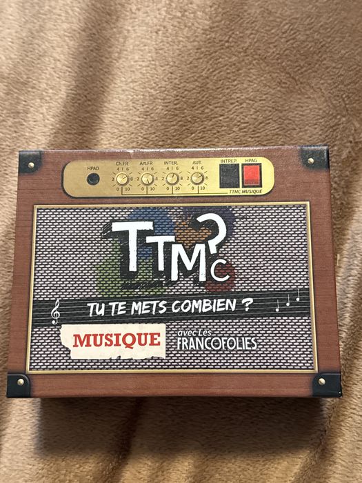 Музикална настолна игра "TTMC? Tu te mets combien? Musique" (на френски)