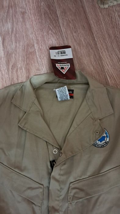 Продам новый фирменный комбинезон!