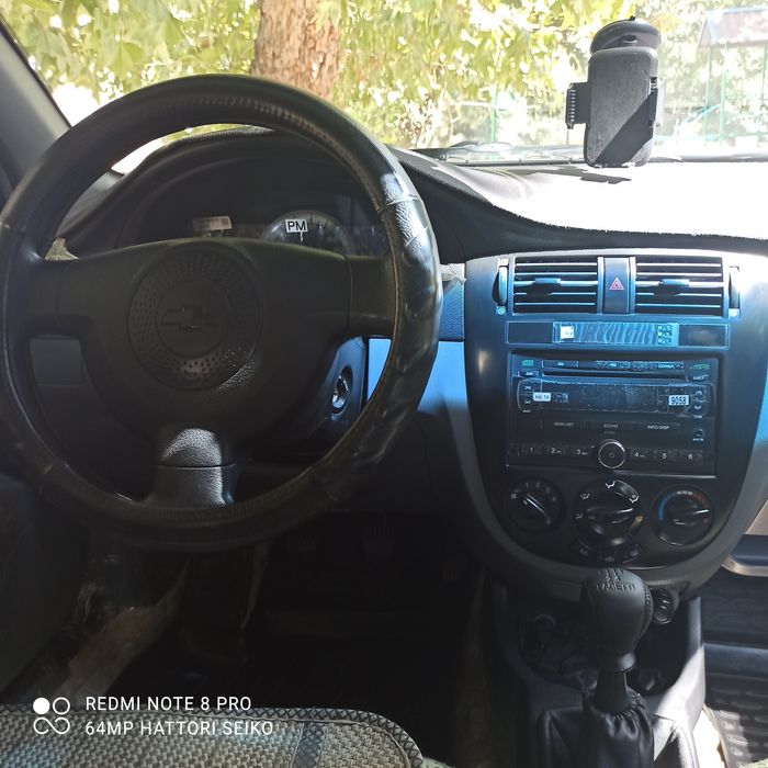 Лачетти 1.8 отличная 2011г.в. 7500у.е.