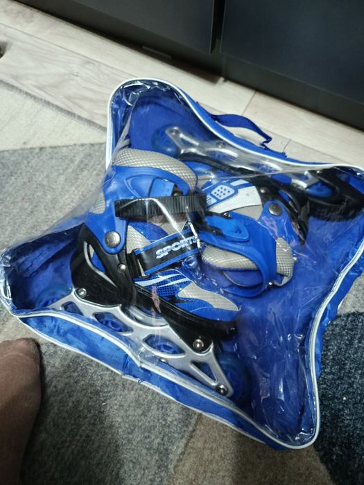 Роликовые коньки