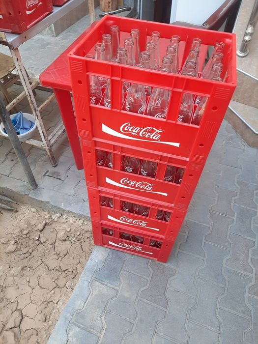 Кока-кола тара бор бутилкаси билан