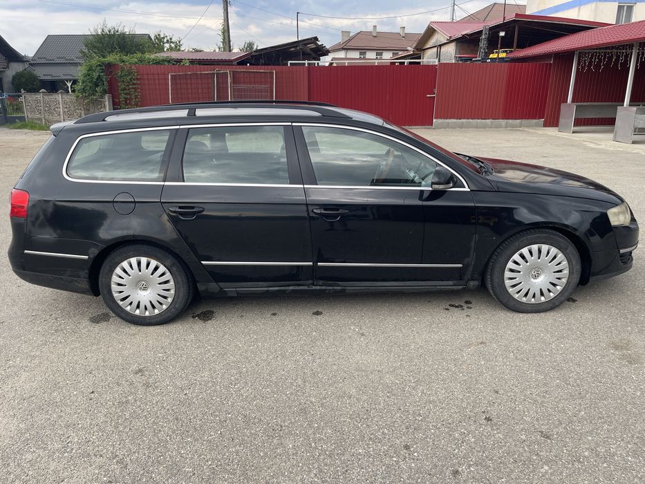 VW Passat B6 + două seturi de anvelope de iarnă (8 bucăți)