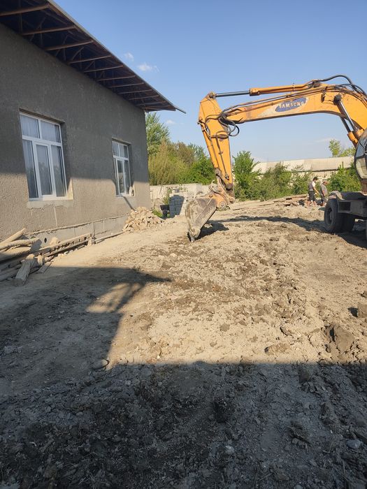 Экскаватор хизмати