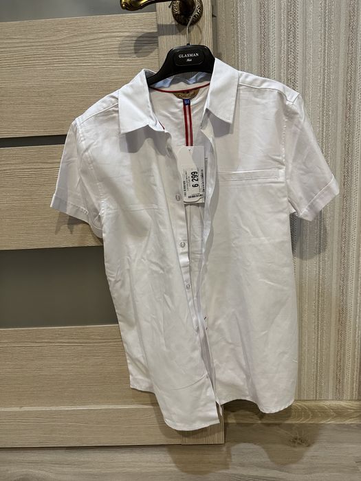 Продам новые школьные рубашки