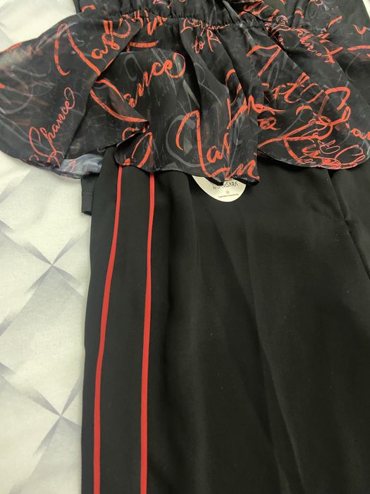 Новый костюм 38 р