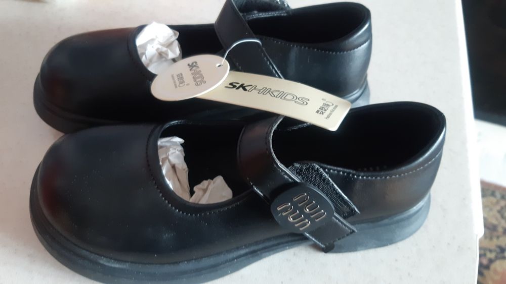 Детские туфли черные