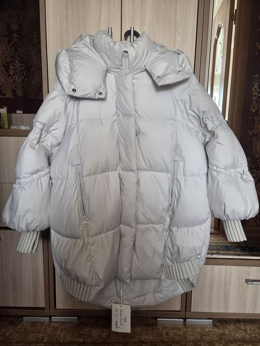 Продам пуховик новый