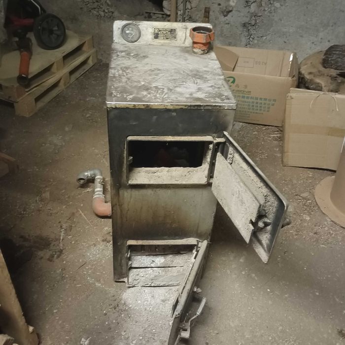 Продавам камина с водна риза на дърва 16кW руска.