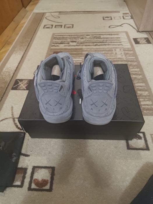 KAWS x Air Jordan 4 Retro Cool Grey