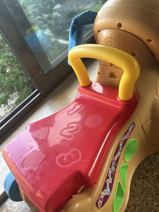 Premergător Fisher-Price Laugh & Learn Stride-to-Ride Puppy