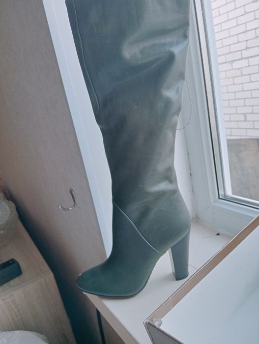 Продам сапоги новые