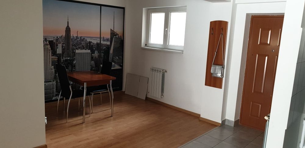 Apartament ultracentral de închiriat 2 camere cu loc de parcare.