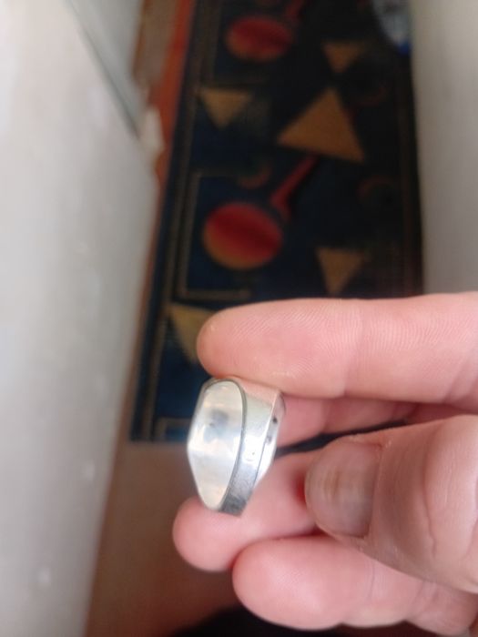 Печатка серребро с золотом.