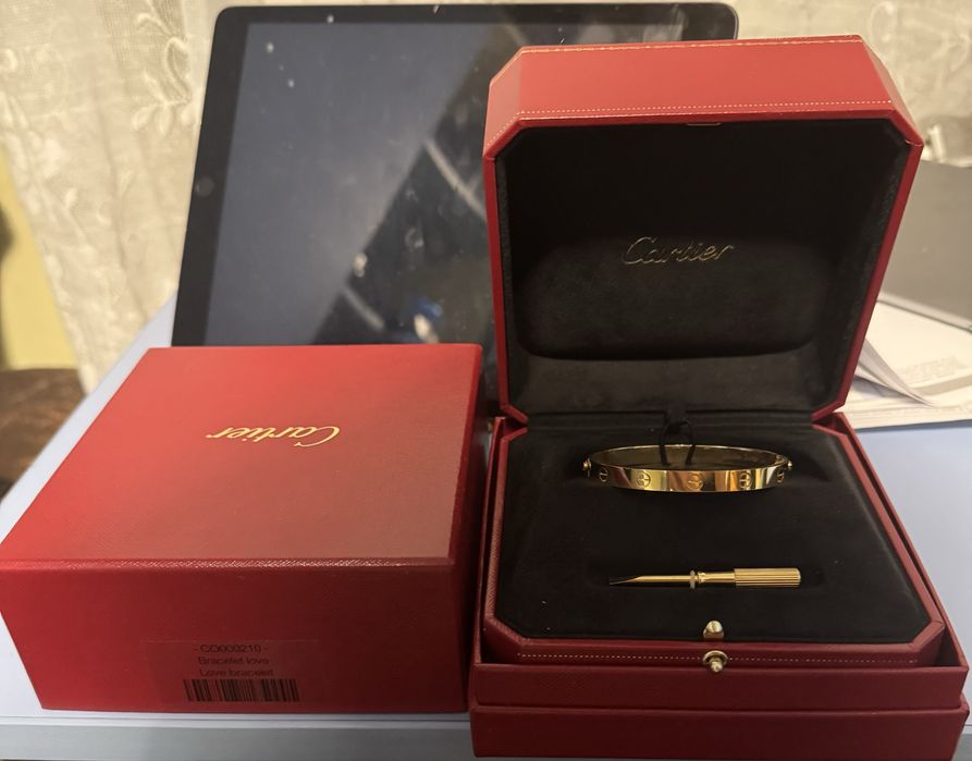 Vand aur 18 k sub forma de bratara cartier love 33 grame. La pret spot