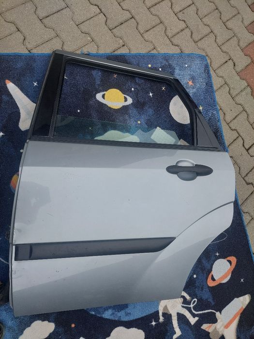 Usa spate stanga ,ford focus break.Fara rugina.