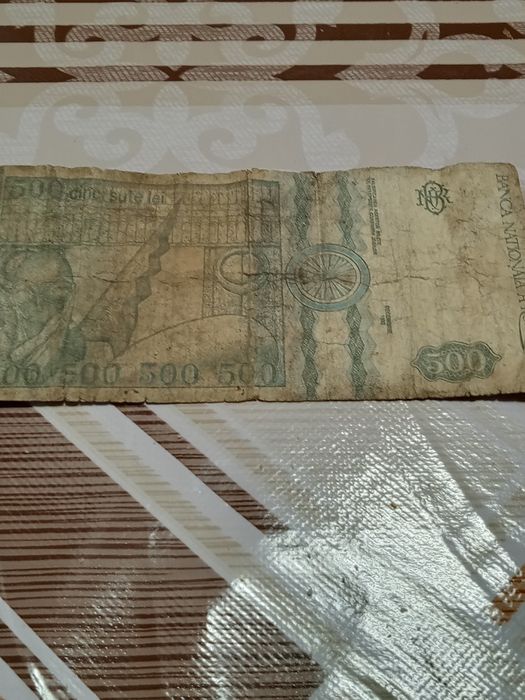 Vind monede vechi și bagnotă de 500 lei