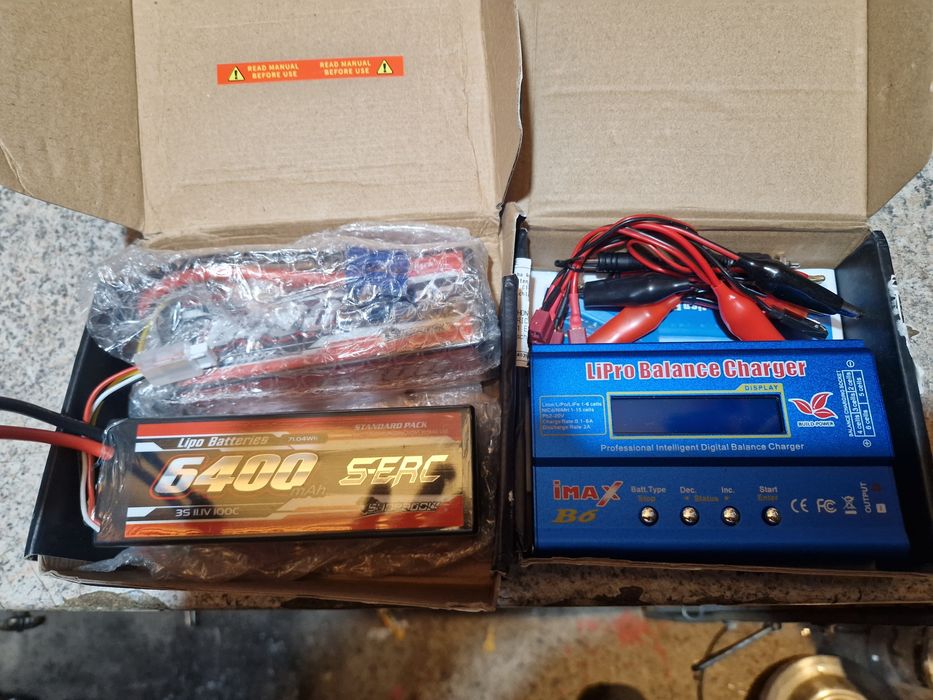 Set 2 baterii noi 6400ma si incarcator xmax