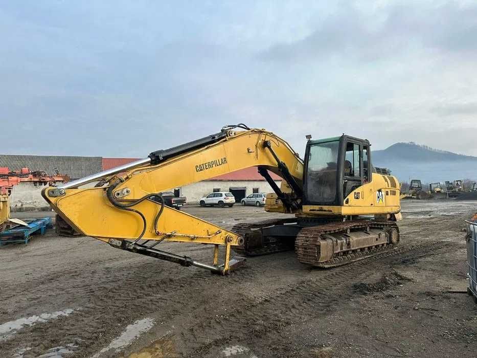 Cabina excavator pe senile Caterpillar 323 DNL